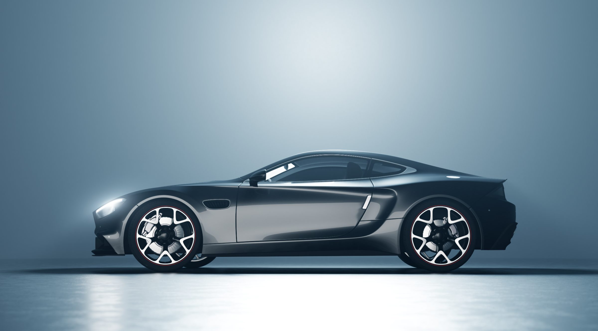 Sleek dark gray sports car with open door displayed against blue gradient background